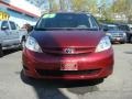 2009 Salsa Red Pearl Toyota Sienna LE  photo #2