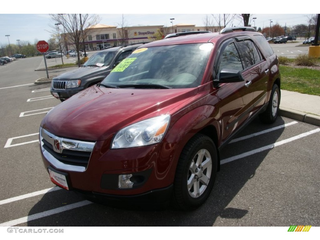 2007 Outlook XE AWD - Red Jewel / Black photo #1