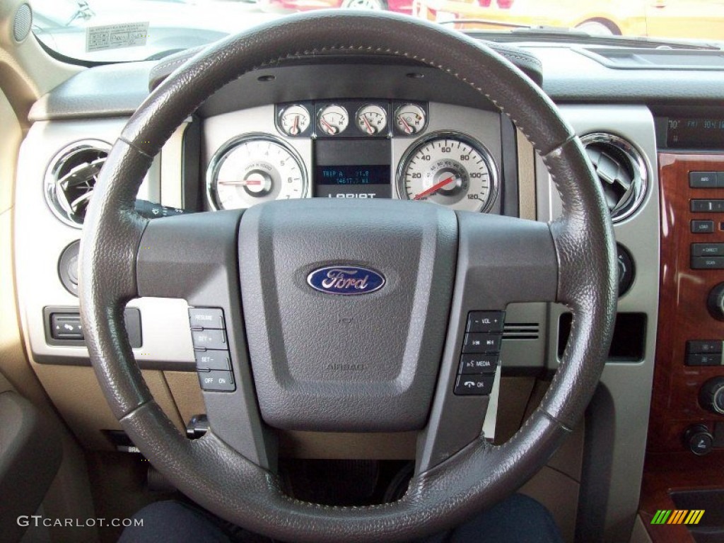 2010 F150 Lariat SuperCrew 4x4 - Dark Blue Pearl Metallic / Tan photo #22