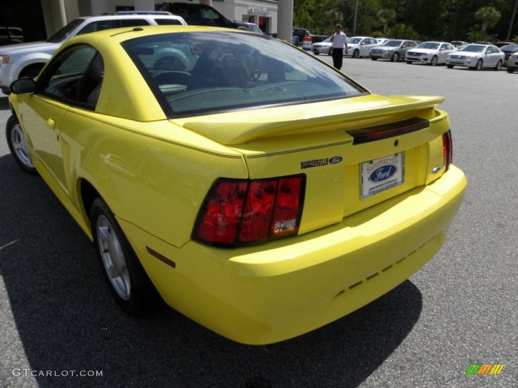 2002 Mustang V6 Coupe - Zinc Yellow / Medium Graphite photo #12