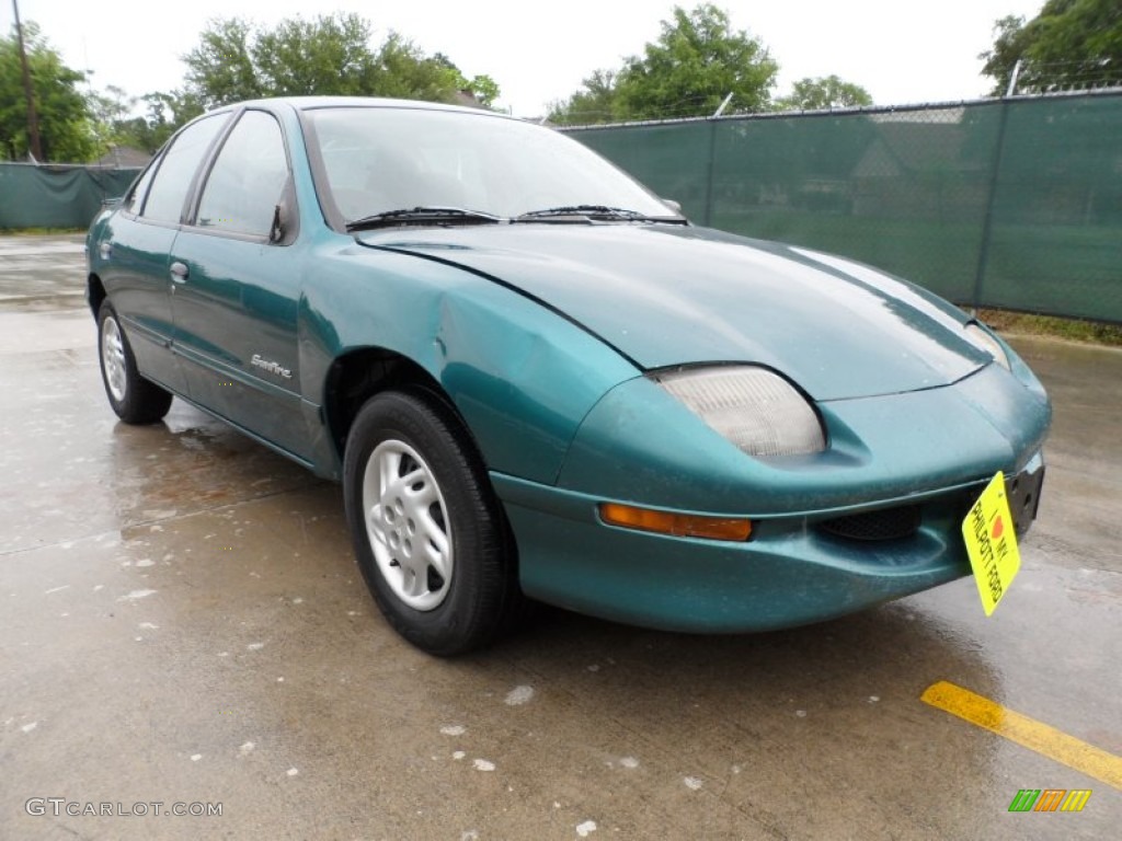 1999 Sunfire SE Sedan - Medium Green Blue Metallic / Graphite photo #1