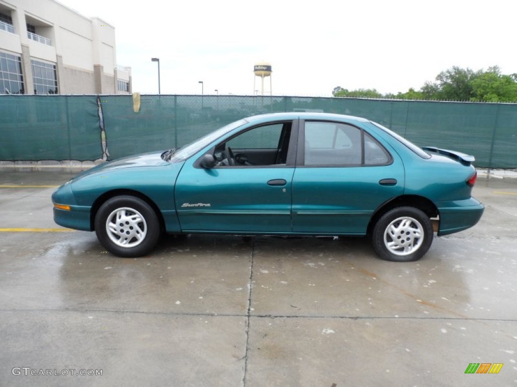 Medium Green Blue Metallic 1999 Pontiac Sunfire SE Sedan Exterior Photo #63900342