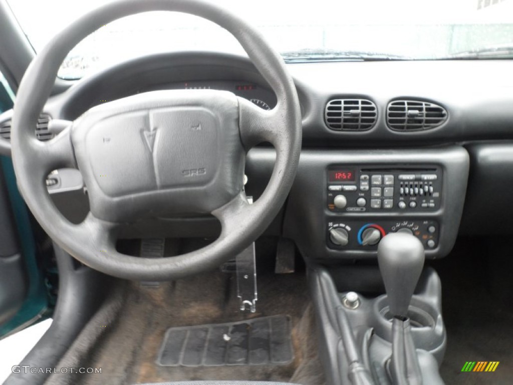 1999 Sunfire SE Sedan - Medium Green Blue Metallic / Graphite photo #23