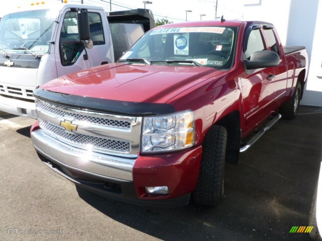 2007 Silverado 1500 LS Extended Cab 4x4 - Sport Red Metallic / Ebony Black photo #3