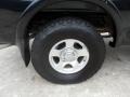 2003 Ford F150 XLT SuperCab 4x4 Wheel and Tire Photo