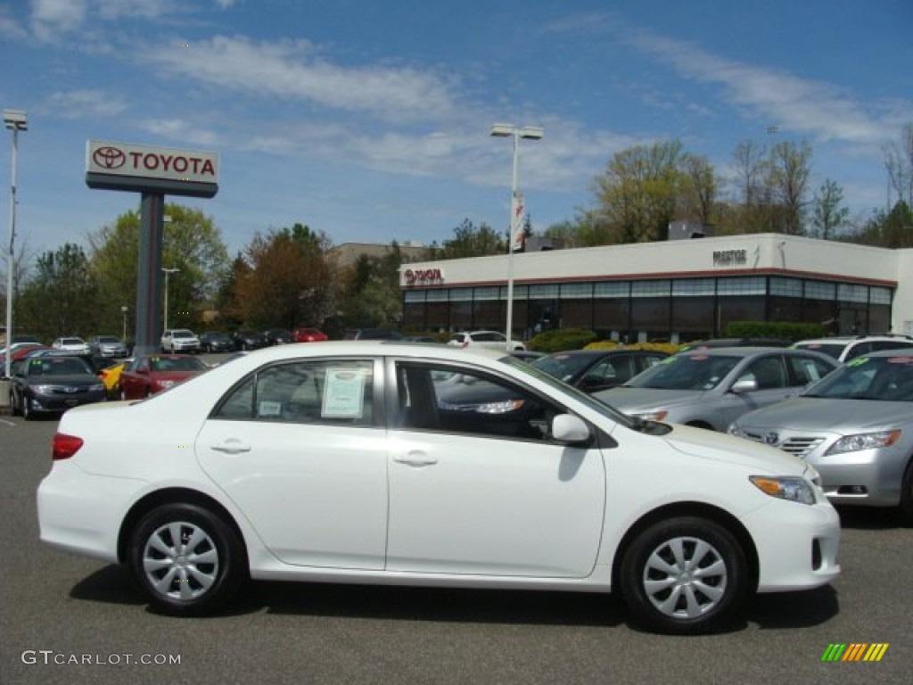 2011 Corolla LE - Super White / Ash photo #1