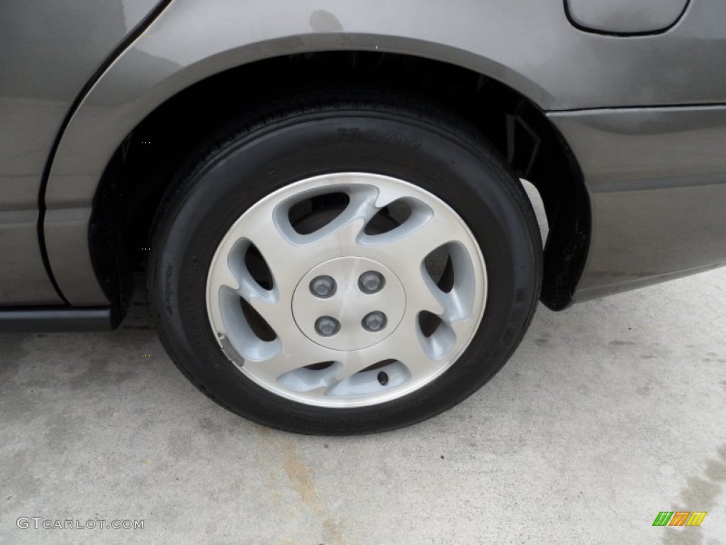 2000 Saturn S Series SL2 Sedan Wheel Photo #63944061
