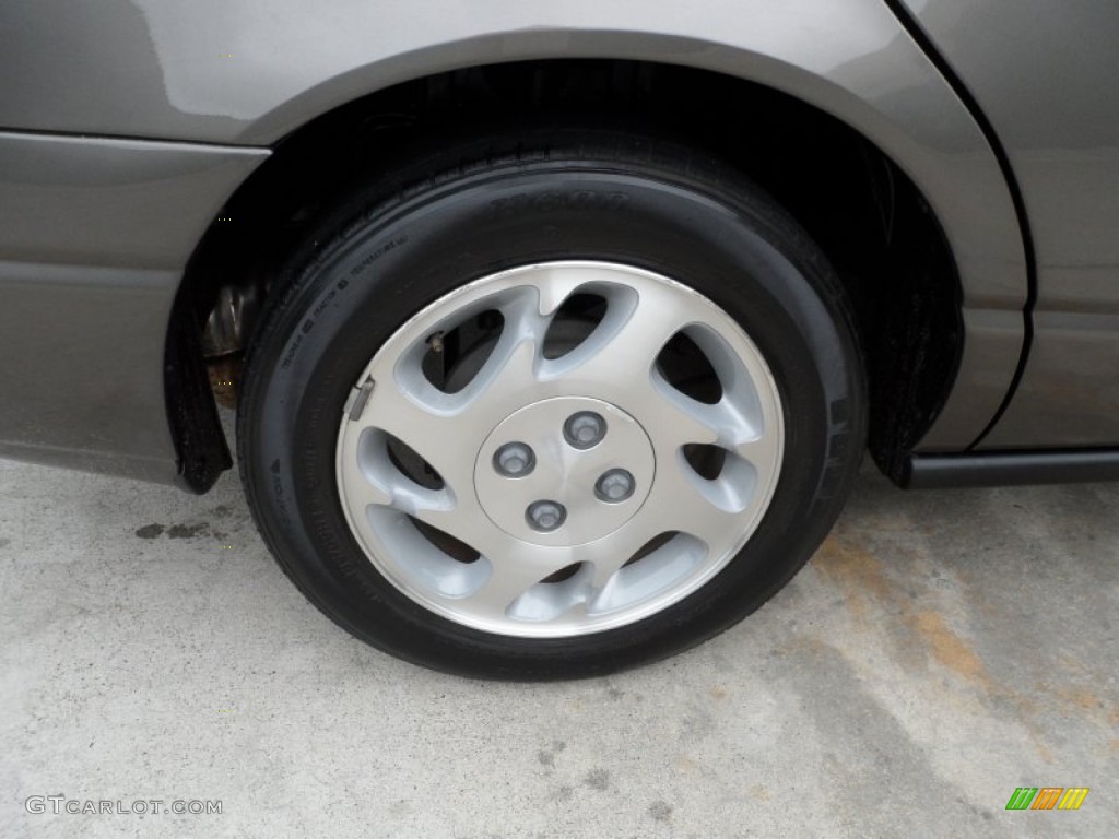2000 Saturn S Series SL2 Sedan Wheel Photo #63944071