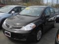 Super Black - Versa 1.8 S Hatchback Photo No. 1
