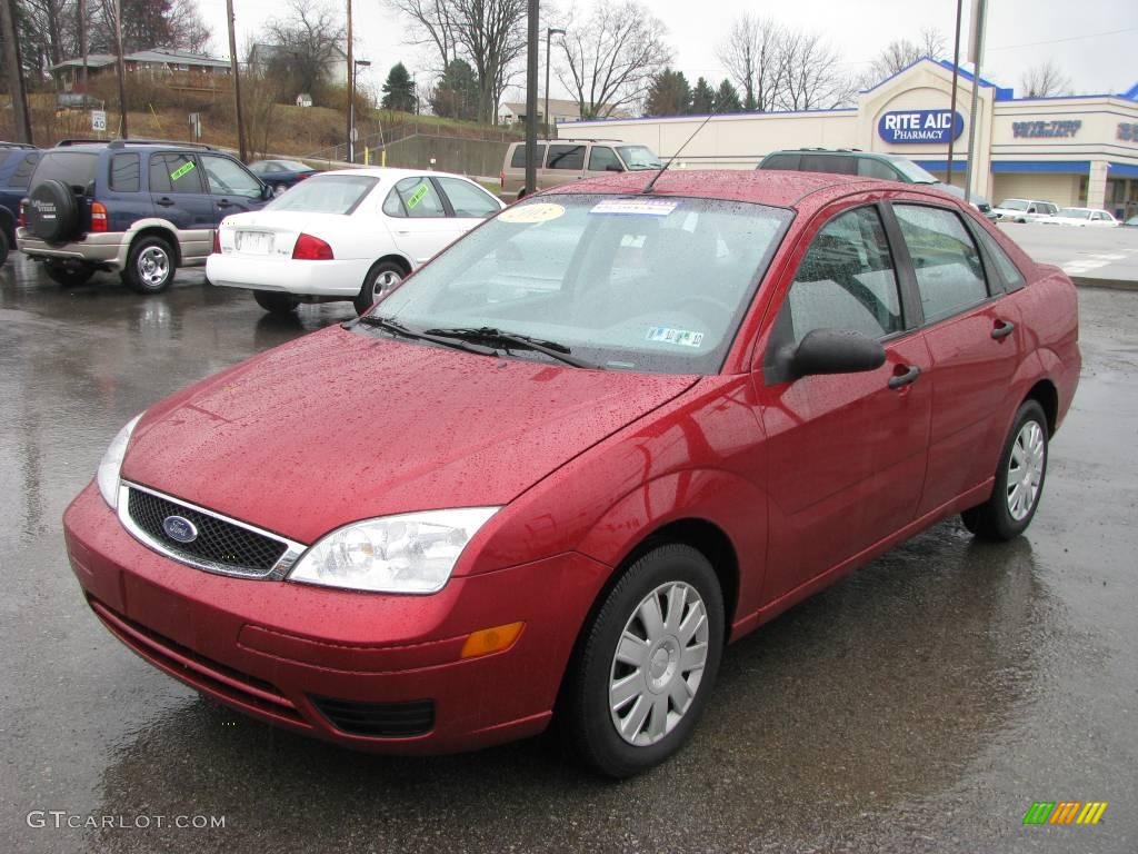 2005 Focus ZX4 S Sedan - Sangria Red Metallic / Dark Flint/Light Flint photo #9