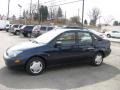 2003 Twilight Blue Metallic Ford Focus LX Sedan  photo #7