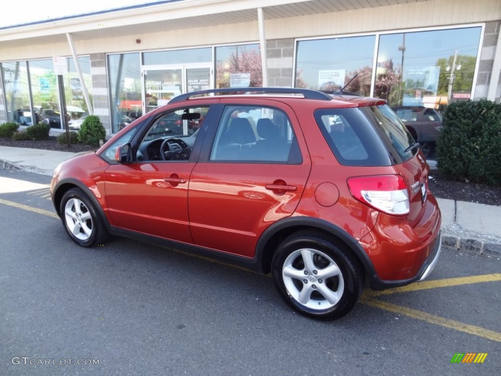 2009 SX4 Crossover Technology AWD - Cherry Red Metallic / Black photo #9