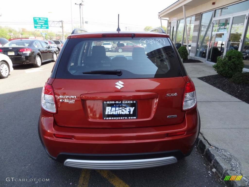 2009 SX4 Crossover Technology AWD - Cherry Red Metallic / Black photo #11
