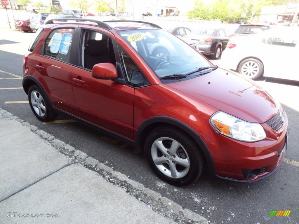 2009 SX4 Crossover Technology AWD - Cherry Red Metallic / Black photo #14