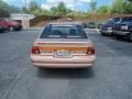 1994 Tucson Bronze Metallic Ford Escort LX Sedan  photo #6