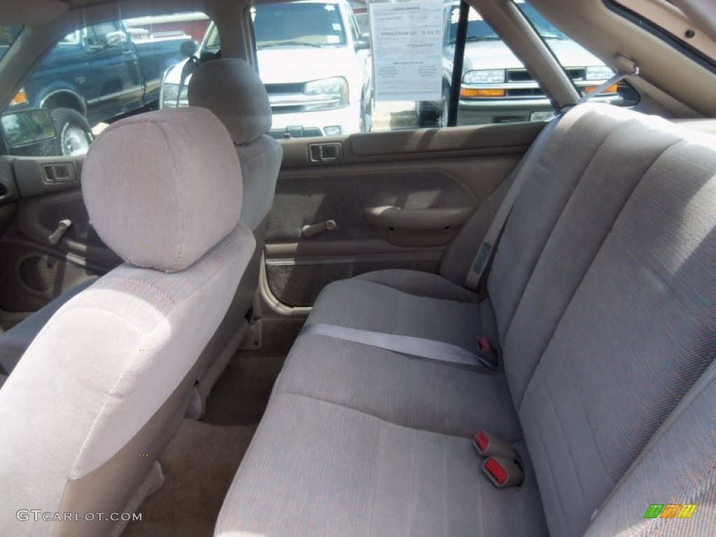 Tan Interior 1994 Ford Escort LX Sedan Photo #64042090