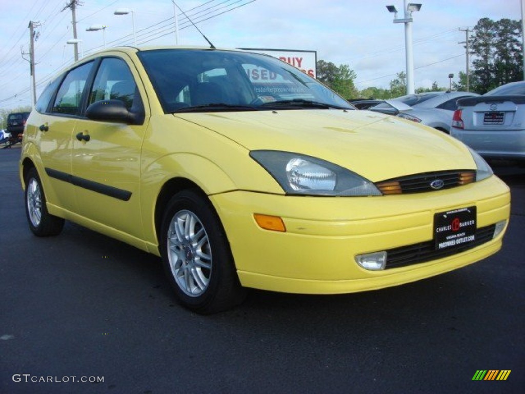 2003 Focus ZX5 Hatchback - Screaming Yellow / Medium Graphite photo #1