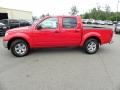 2010 Red Alert Nissan Frontier SE Crew Cab  photo #2