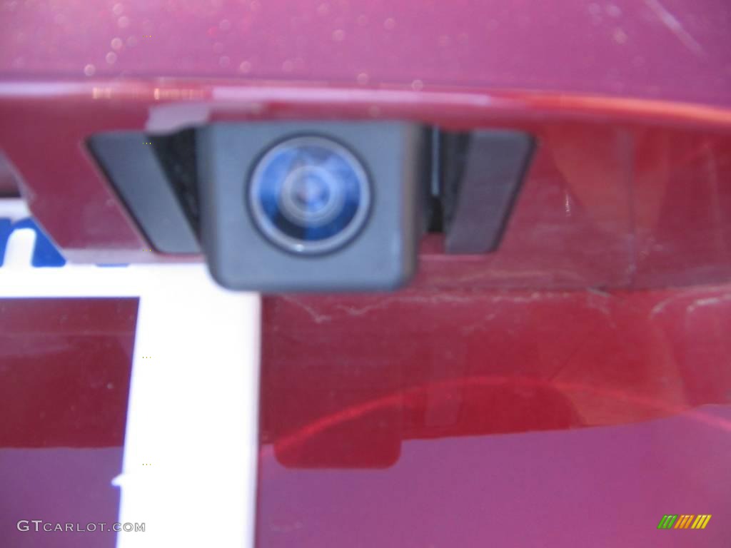 2009 Enclave CXL AWD - Red Jewel Tintcoat / Dark Titanium/Titanium photo #9