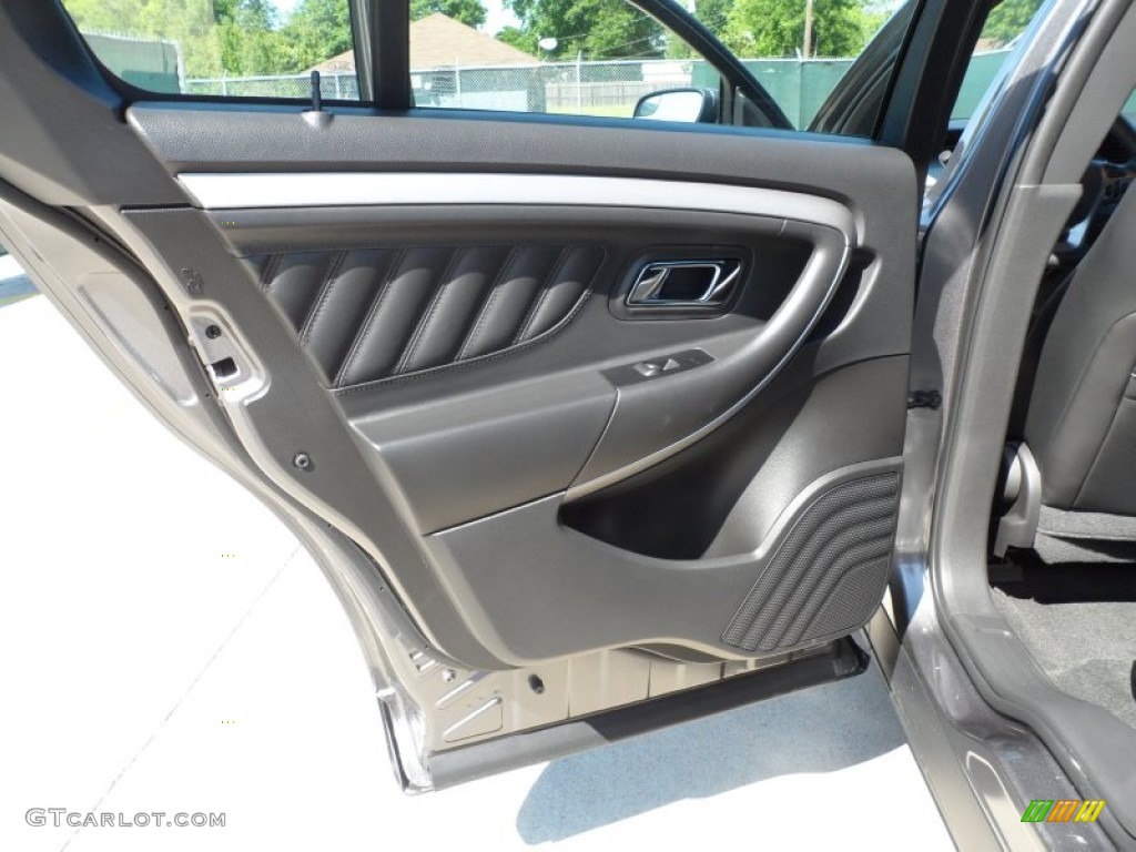 2013 Ford Taurus SEL Charcoal Black Door Panel Photo #64279118