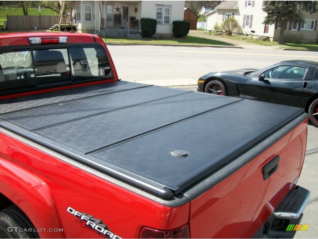 2008 Canyon SLE Extended Cab 4x4 - Red Orange Metallic / Ebony photo #9