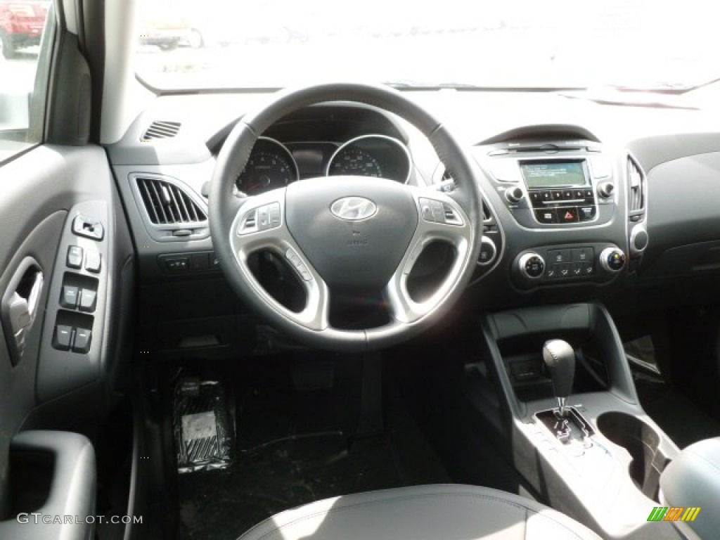 2012 Tucson GLS - Diamond Silver / Black photo #14