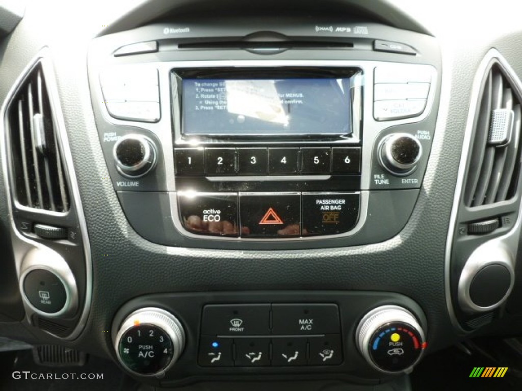 2012 Tucson GLS - Diamond Silver / Black photo #18