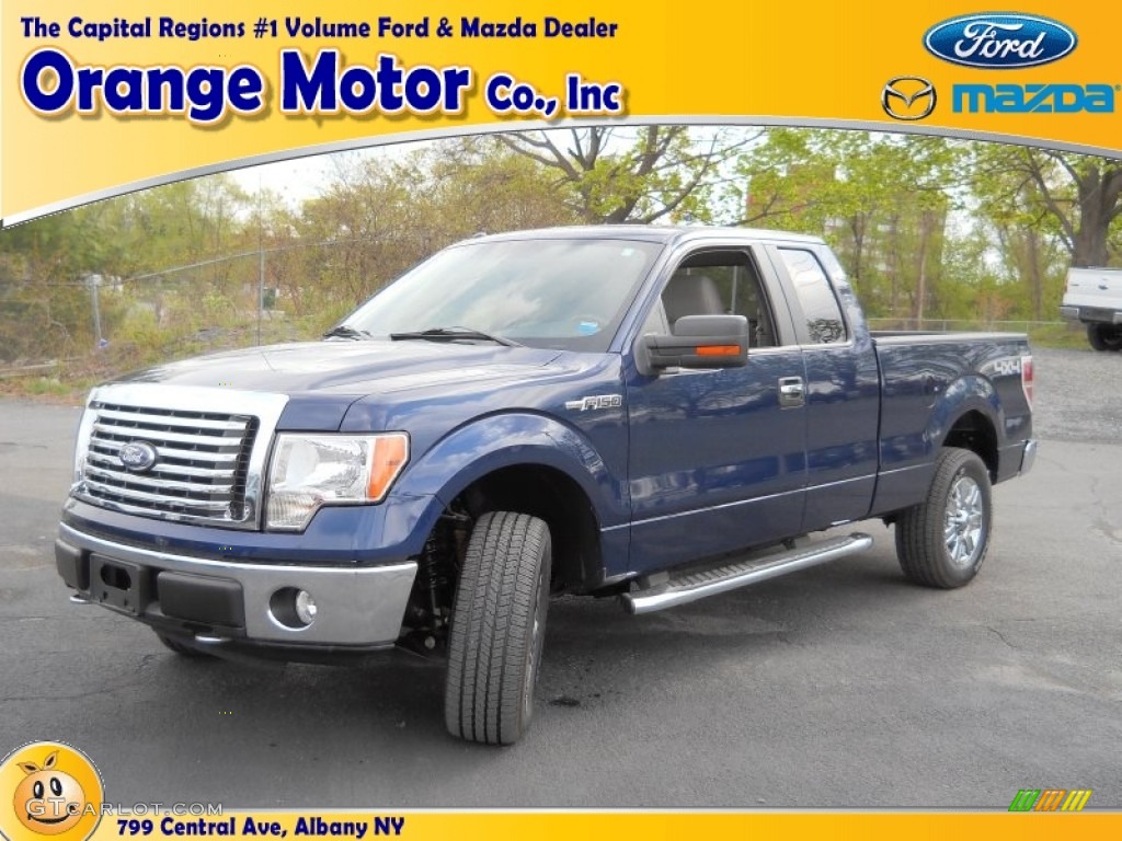 2010 F150 XLT SuperCab 4x4 - Dark Blue Pearl Metallic / Medium Stone photo #1