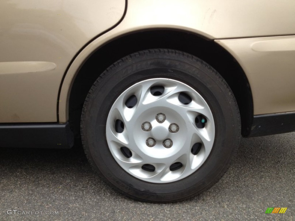 2000 Saturn L Series LS1 Sedan Wheel Photo #64370952