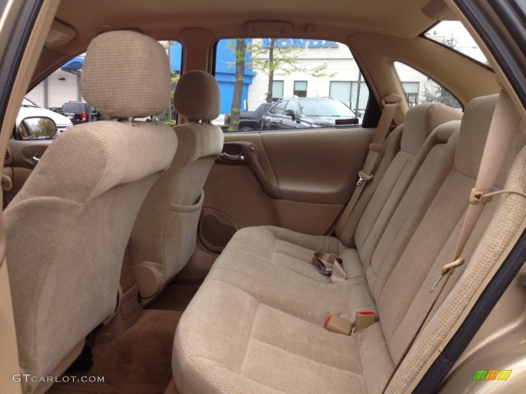 Medium Tan Interior 2000 Saturn L Series LS1 Sedan Photo #64371056