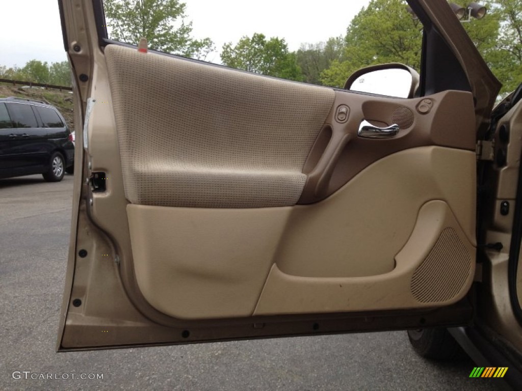 2000 Saturn L Series LS1 Sedan Medium Tan Door Panel Photo #64371156