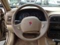 2000 Saturn L Series Medium Tan Interior Steering Wheel Photo