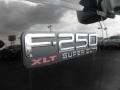 2003 Ford F250 Super Duty XLT Crew Cab 4x4 Badge and Logo Photo