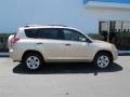 2010 Sandy Beach Metallic Toyota RAV4 I4  photo #2