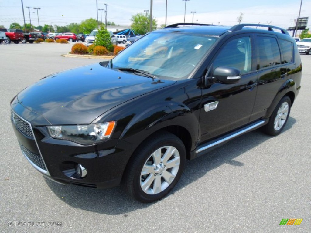 2010 Outlander SE - Labrador Black Pearl / Black photo #1