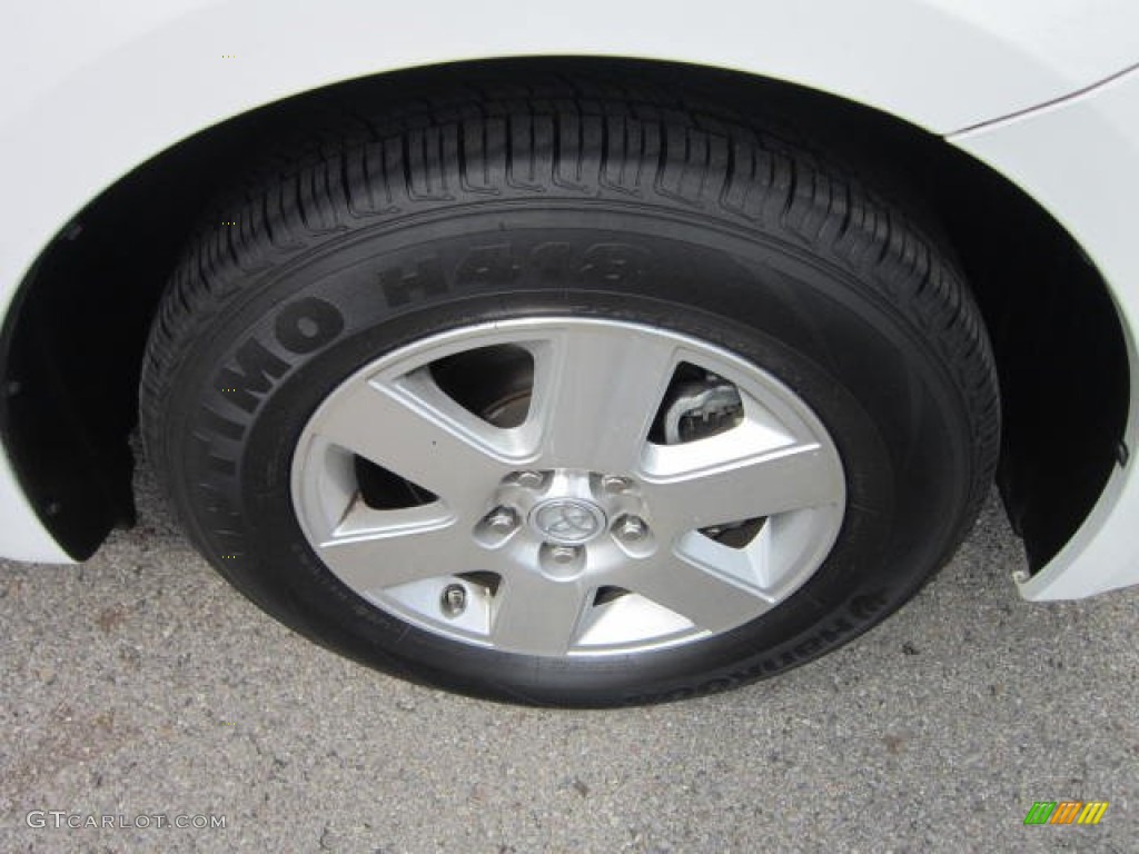 2009 Sienna LE - Super White / Taupe photo #8