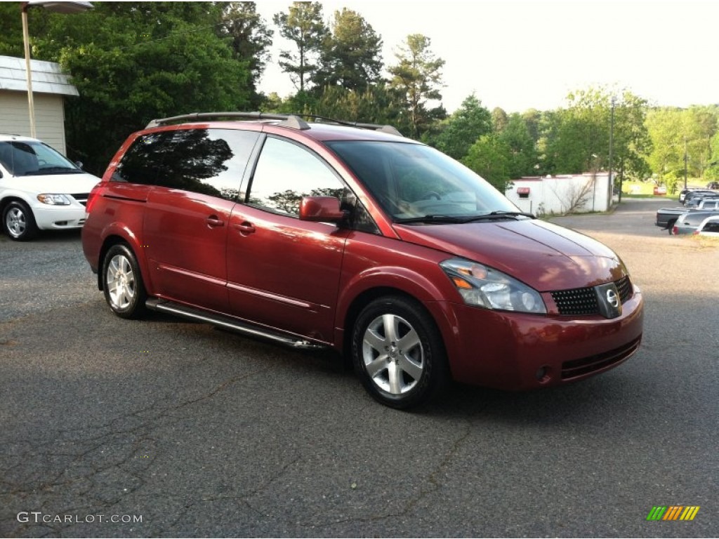 Autumn Red Metallic Nissan Quest