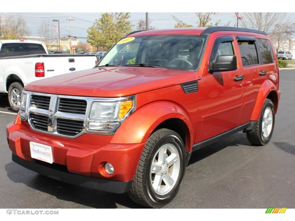 2007 Nitro SXT 4x4 - Sunburst Orange Pearl / Dark Slate Gray photo #18