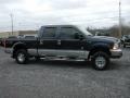 2003 True Blue Metallic Ford F250 Super Duty XLT Crew Cab 4x4  photo #13