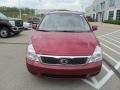 2011 Claret Red Kia Sedona LX  photo #4