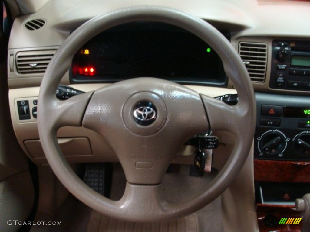 2006 Toyota Corolla LE Beige Steering Wheel Photo #64461535
