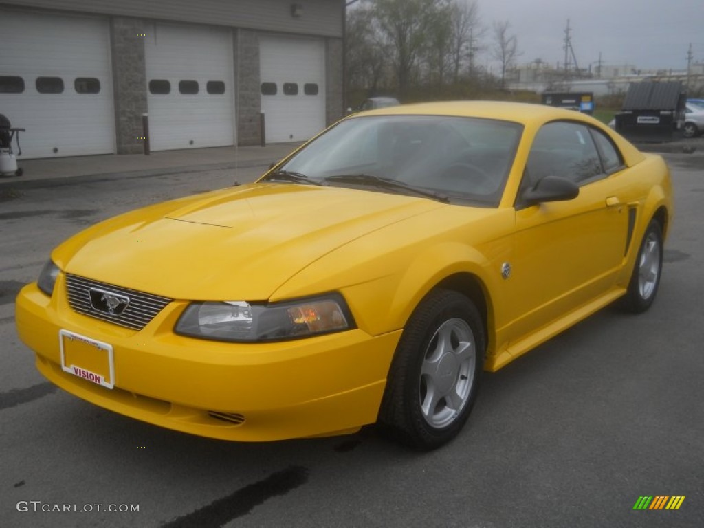 Screaming Yellow 2004 Ford Mustang V6 Coupe Exterior Photo #64494606