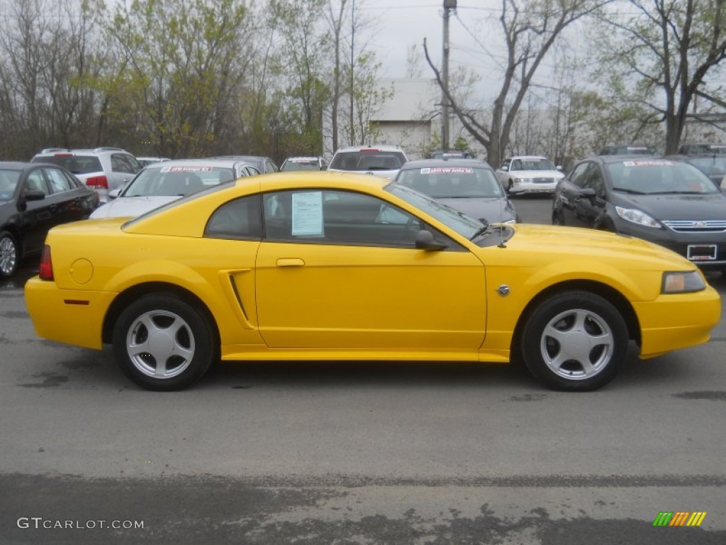 Screaming Yellow 2004 Ford Mustang V6 Coupe Exterior Photo #64494709