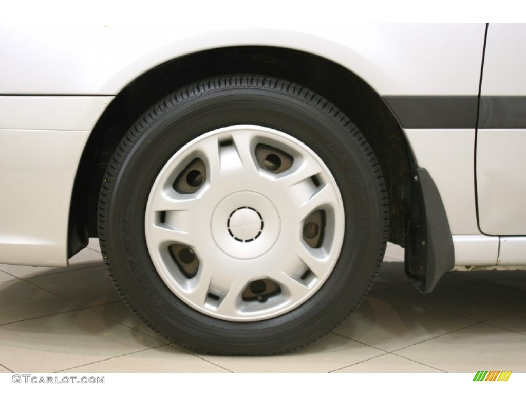 2002 Subaru Legacy L Sedan Wheel Photo #64549398