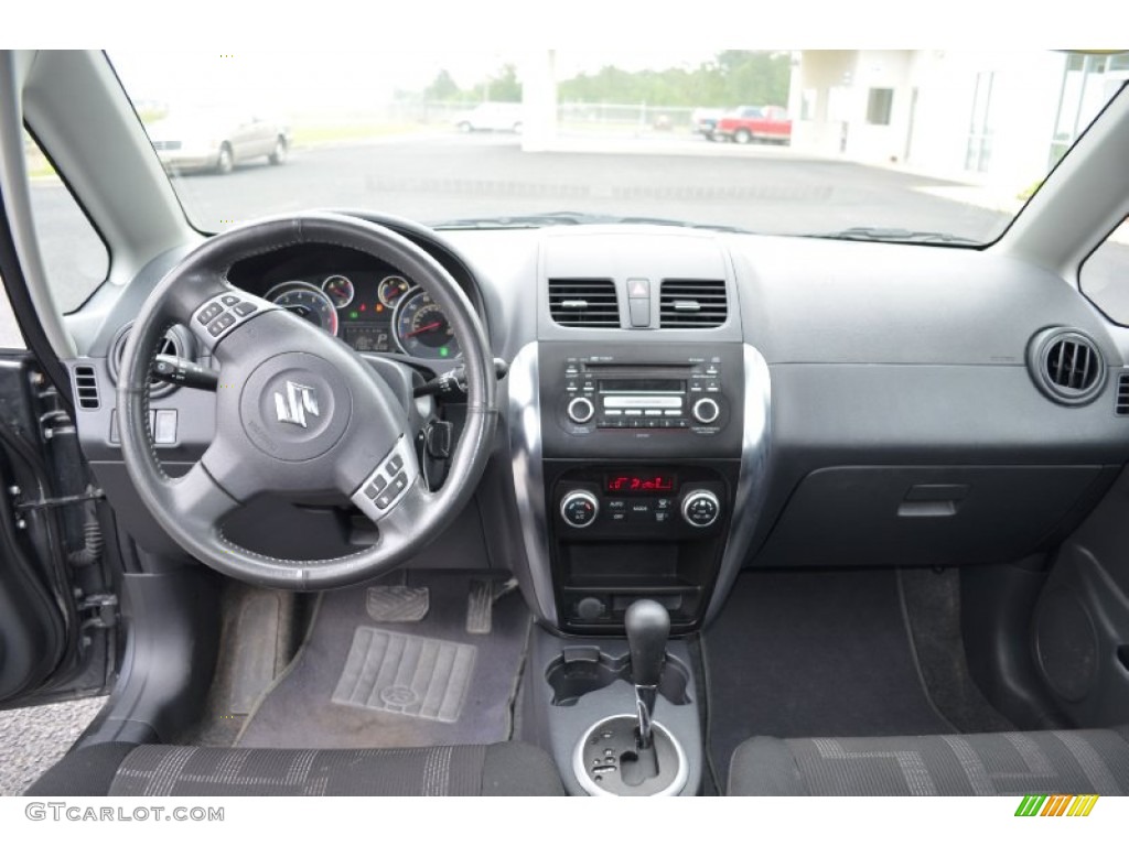 2010 Suzuki SX4 Crossover Touring AWD Black Dashboard Photo #64551499