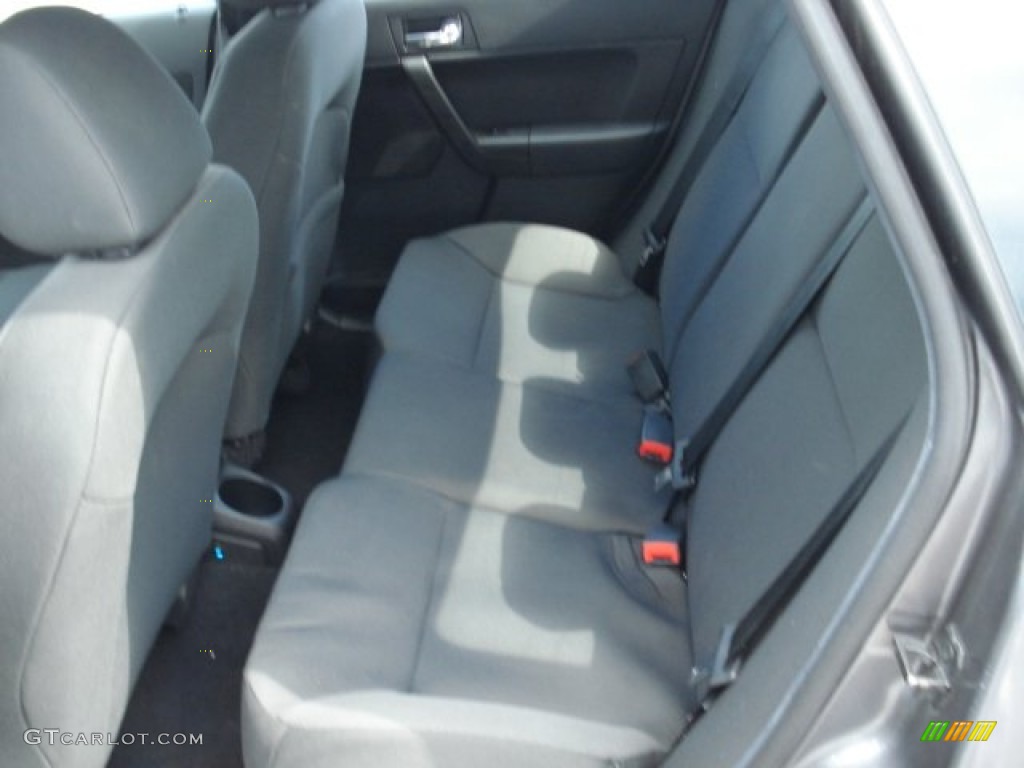 2010 Focus SES Sedan - Sterling Grey Metallic / Charcoal Black photo #13