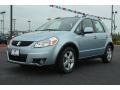 2010 Glacier Light Blue Metallic Suzuki SX4 Crossover Touring AWD  photo #1