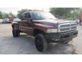 2002 Dark Garnet Red Pearlcoat Dodge Ram 3500 SLT Quad Cab 4x4 Dually  photo #3