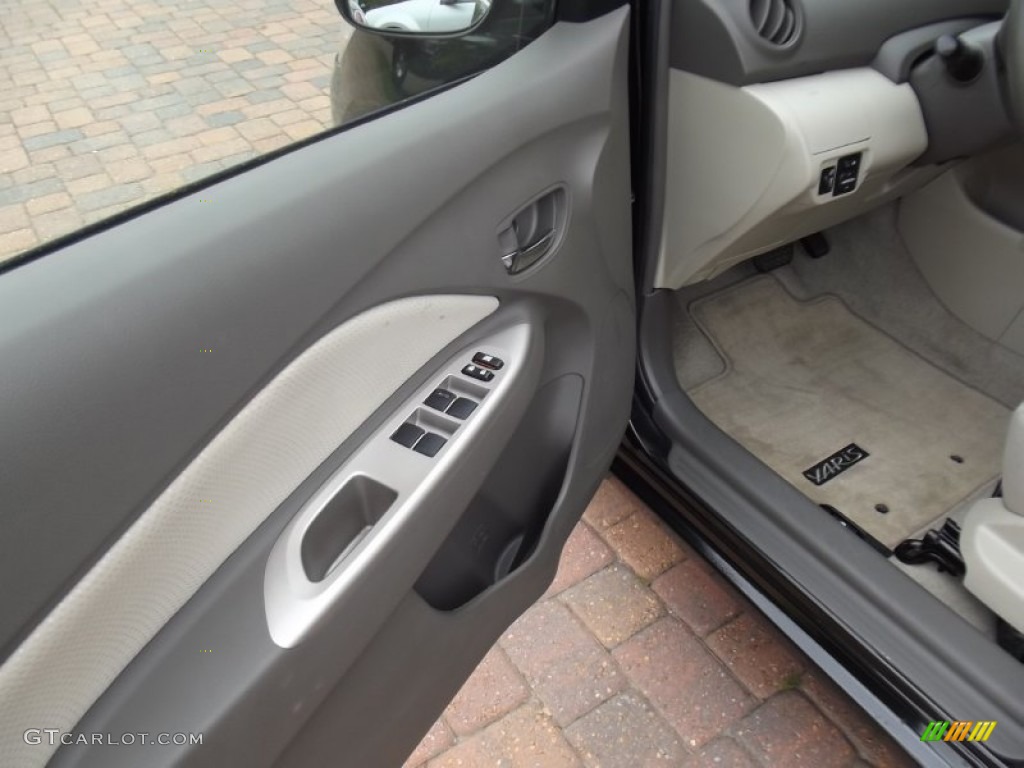 2010 Yaris Sedan - Black Sand Pearl / Bisque photo #7