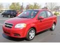 2010 Victory Red Chevrolet Aveo LT Sedan  photo #1